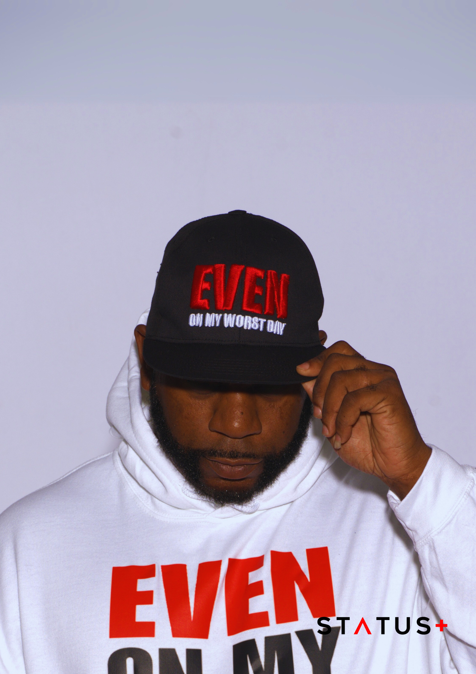 "Even on My Worst Day" Black Trucker Hat (red and white logo)